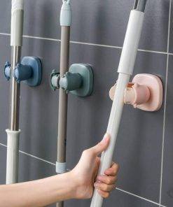 support manche fixation adhésive sans trou