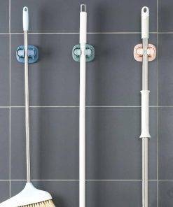 support manche fixation adhésive sans trou